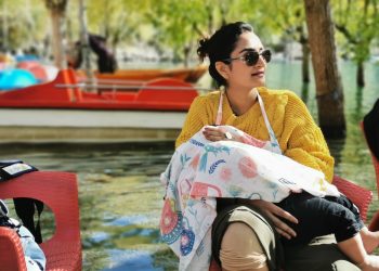 Mother Breastfeeding Child in Upper Khachura